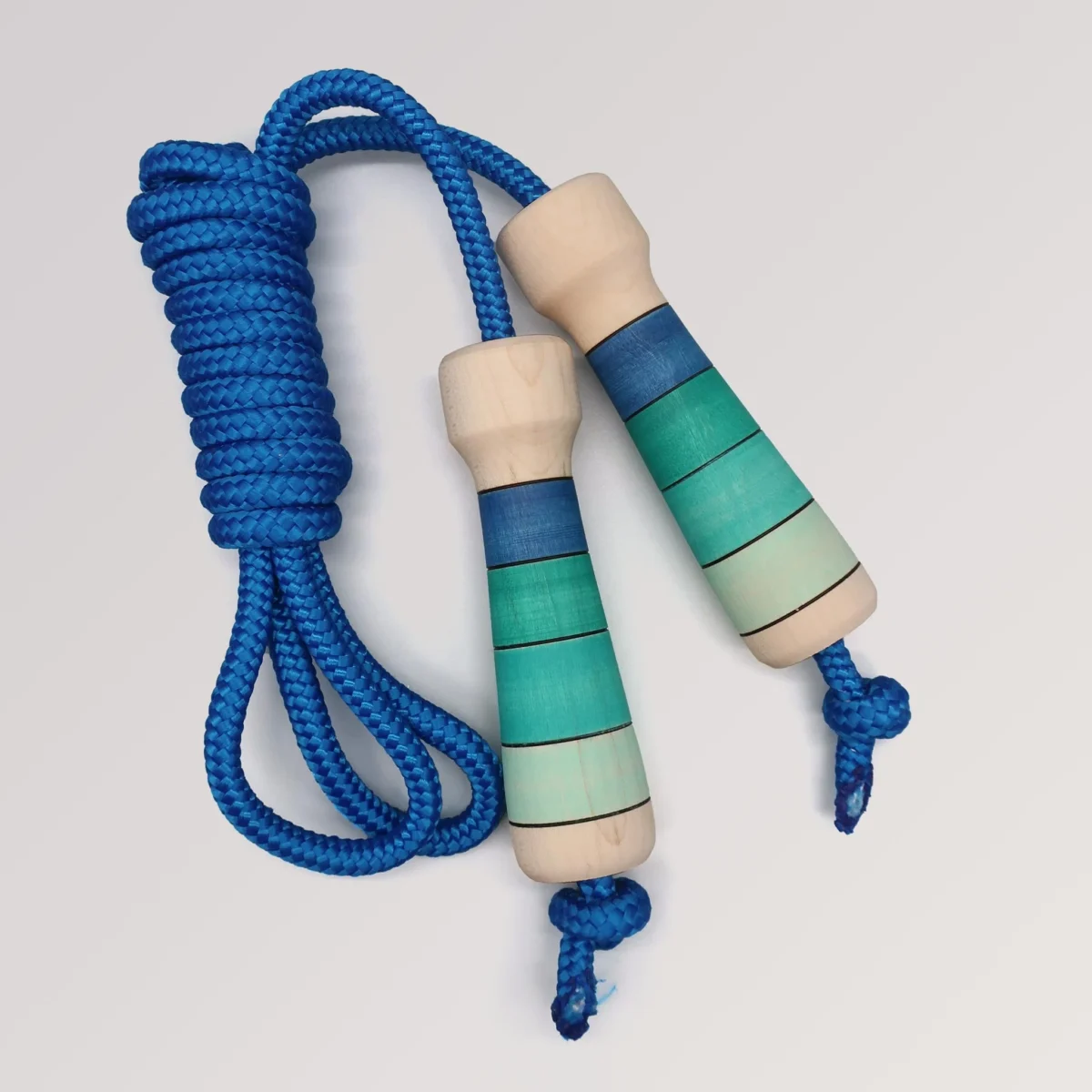 Skipping rope with hand-turned wooden handle