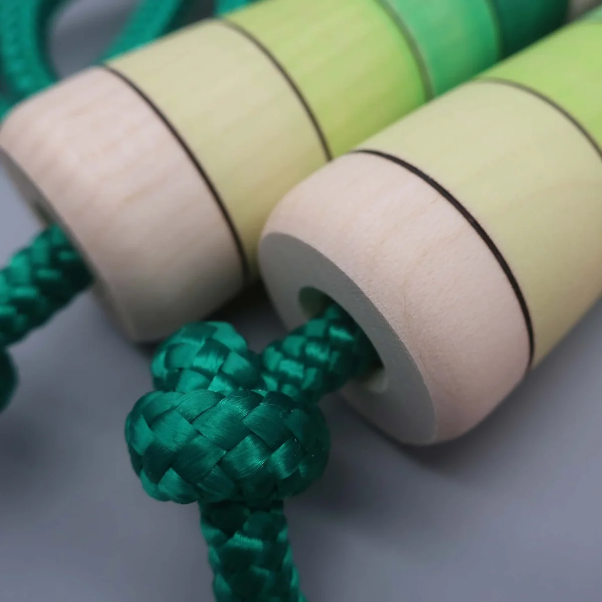 Skipping rope with hand-turned wooden handle